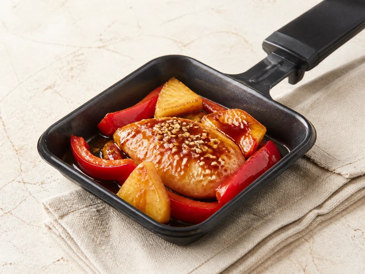 Teriyaki-Hähnchen frisch zubereitet im Raclette-Pfännchen